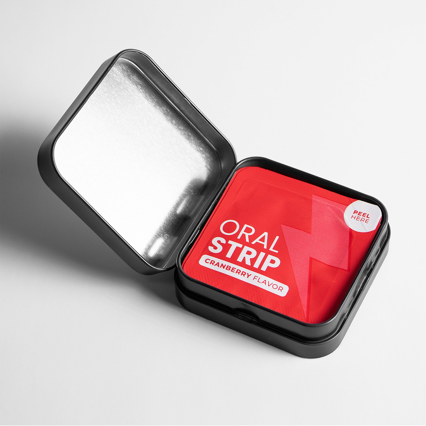 Quick-dissolving Premium Energy Strips in a red and black box labeled "Oral Strip" for on-the-go use.